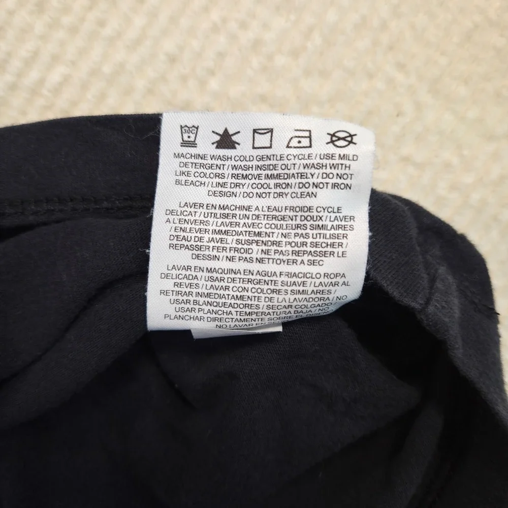 Just Do It Nike Girl's XL Black Top with Pink Writing